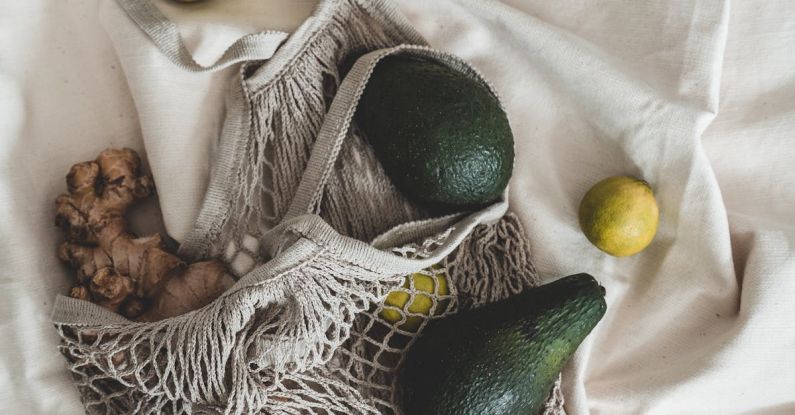 Ethical Shopping - Yellow Round Fruits on White Textile