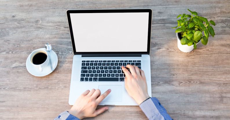 Freelancing - Person's Hand on Laptop