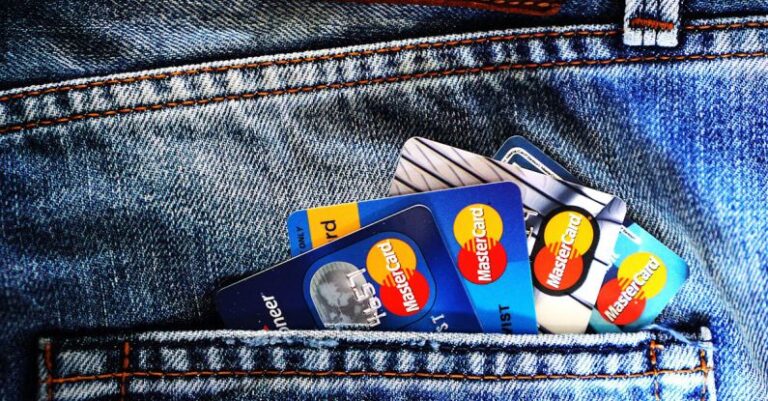 Credit Score - Blue Master Card on Denim Pocket