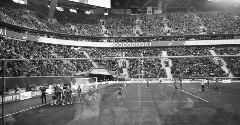 Fan Communities - Stadium players celebrating goal during football match